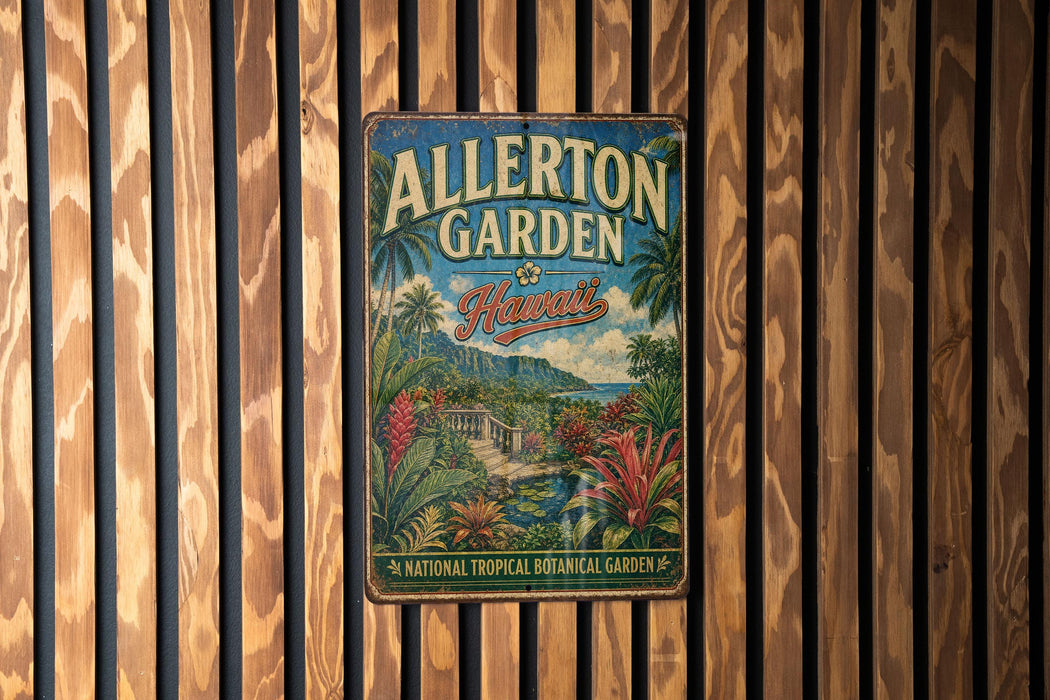 A vintage metal sign for Allerton Garden in Hawaii, featuring a tropical landscape with palm trees, flowers, and a tropical waterfall.