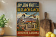 A vintage metal sign for Appleton-Whittell Research Ranch in Audubon, Arizona, featuring a bird and desert landscape.