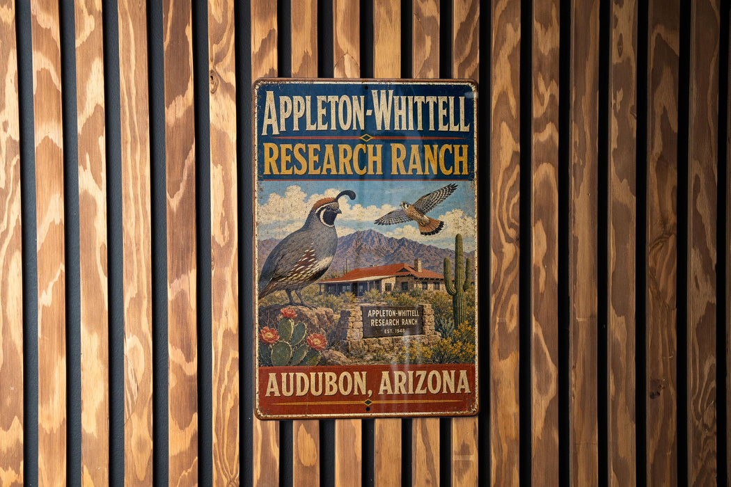 A vintage metal sign for Appleton-Whittell Research Ranch in Audubon, Arizona, featuring a bird and desert landscape.