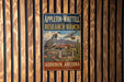 A vintage metal sign for Appleton-Whittell Research Ranch in Audubon, Arizona, featuring a bird and desert landscape.
