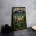 a vintage metal sign with the text "AUDUBON CENTER IN GREENWICH CONNECTICUT" and an illustration of a bird standing on a pond.