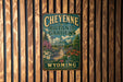 A vintage-style metal sign for Cheyenne Botanic Gardens in Wyoming, featuring a lush garden scene with various plants and flowers.