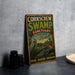 A vintage-style metal sign for the Corkcrew Swamp Sanctuary in Florida, featuring an illustration of a bird and a large alligator.