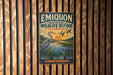 A vintage metal sign for the Emiquon National Wildlife Refuge in Illinois, featuring a bird and a sunset landscape.