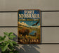 A vintage-style metal sign for the Fort Niobrara National Wildlife Refuge in Nebraska, featuring an illustration of a buffalo and an eagle in a scenic landscape.