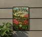 A vintage-style sign for "Green Spring Gardens" in Virginia, featuring a garden scene with flowers and a gazebo.