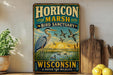 A vintage-style metal sign for the Horizon Marsh Bird Sanctuary in Wisconsin, featuring an illustration of a heron and ducks in a marshy landscape with a sunset.