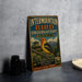 A vintage metal sign for the Intermountain Bird Observatory in Idaho, featuring a colorful illustration of a bird and a mountain landscape.