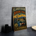 A vintage-style metal sign for the Klath Basin Birding Trail in California, featuring illustrations of various birds and a scenic landscape.