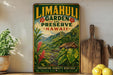 A vintage-style metal sign for Limahui Garden and Preserve in Hawaii, featuring a tropical landscape with mountains, palm trees, and a hut.