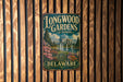 A vintage metal sign for Longwood Gardens in Delaware, featuring a scenic illustration of the gardens and a fountain.