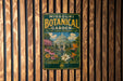 A vintage-style metal sign for the Missouri Botanical Garden, featuring a colorful illustration of the greenhouse and various flowers.