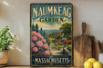 a vintage-style sign for the Naunkeag Garden in Massachusetts, with a scenic landscape of a garden and a house in the background.