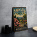 A vintage-style metal sign for the Nautique Garden in Massachusetts, featuring a scenic landscape with a building and flowers.