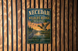 A metal sign for the Necedah National Wildlife Refuge in Wisconsin, featuring a scenic illustration of ducks and a sunset over a lake.