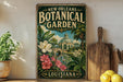A vintage-style metal sign for the New Orleans Botanical Garden, featuring a tropical garden scene with palm trees, flowers, and a greenhouse.