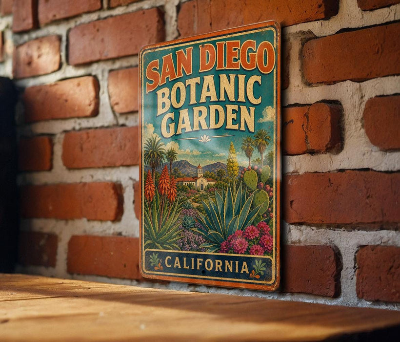 A vintage metal sign for the San Diego Botanic Garden in California, featuring a colorful illustration of the garden's flora and fauna.