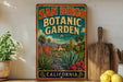 A vintage-style sign for the San Diego Botanic Garden in California, featuring colorful illustrations of various plants and flowers.