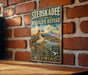 A vintage-style metal sign for the Seedskadee National Wildlife Refuge in Wyoming, featuring a bird perched on a tree stump against a scenic landscape.