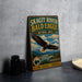 A vintage-style metal sign for the Skagit River Bald Eagle, featuring an illustration of an eagle in flight and the text "Skagit River Bald Eagle Natural Area" and "Wild Washington".