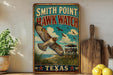 A vintage-style sign for Smith Point Hawk Watch in Texas, featuring an illustration of a hawk in flight and a lookout tower.