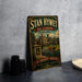 A vintage-style sign for "Stan Hy Wet" Hall & Gardens in Akron, Ohio, featuring an illustration of a historic building surrounded by a well-maintained garden.