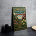 A vintage-style metal sign for Tower Hill Botanic Garden, featuring a castle and flowers, is displayed on a gray wall.