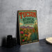 A vintage-style metal sign for the Tucson Botanical Gardens in Arizona, featuring colorful illustrations of desert plants and a desert landscape.