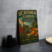 A vintage-style metal sign for the UC Botanical Garden in Berkeley, California, featuring a colorful illustration of the garden and its surroundings.