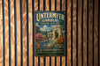 A vintage-style metal sign for "Untermyer Gardens" in New York, featuring an illustration of a garden with a fountain and ornate architecture.