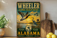A vintage-style metal sign for Wheeler National Wildlife Refuge in Alabama, featuring a colorful illustration of ducks and a bird in flight against a sunset backdrop.
