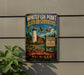 A vintage-style metal sign for the Whitefish Point Bird Observatory in Michigan, featuring a lighthouse and birds in flight.