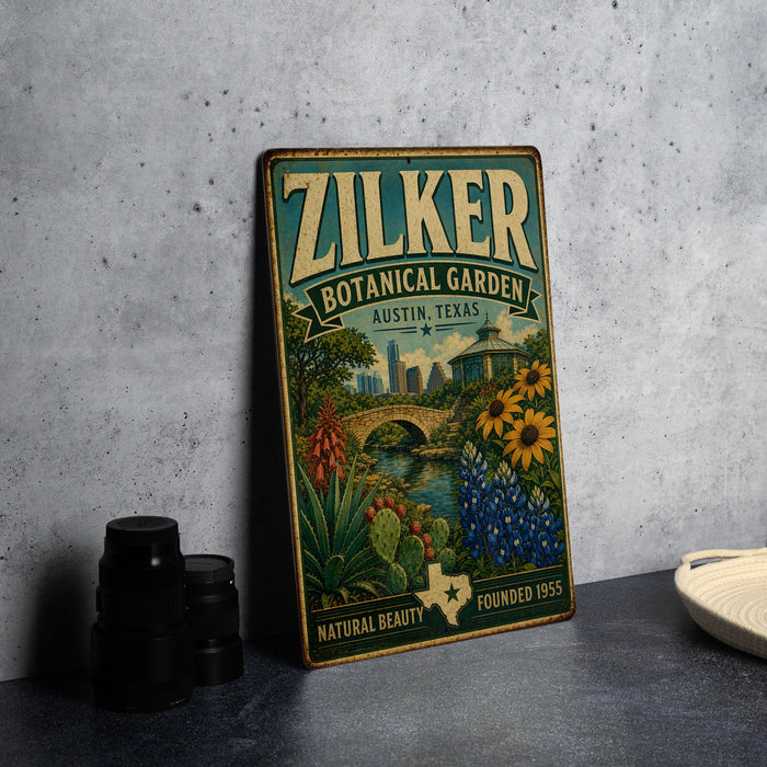 A vintage-style metal sign for the Botanical Garden in Austin, Texas, featuring a colorful illustration of flowers, plants, and a bridge.