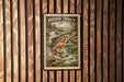A 5c postage stamp featuring a colorful illustration of a Brook Trout leaping out of a river, set against a backdrop of a waterfall and forest.