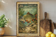 a framed print of a fish, specifically a carp, with a 20 cent stamp on the border. The print is displayed on a shelf next to a wooden cutting board and some kitchen utensils, such as a knife and a spoon.