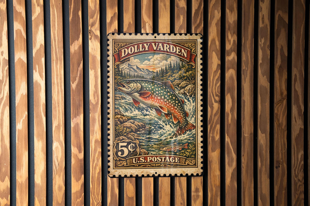 A vintage postage stamp featuring a fish, likely a trout, is displayed on a wooden wall.