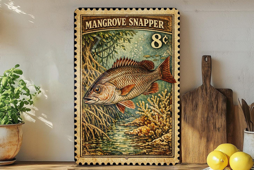 A framed print of a Mangrove Snapper fish, featuring a vibrant illustration of the fish swimming in a tropical underwater scene.
