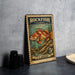 A vintage-style postage stamp featuring a colorful illustration of a rockfish, with the text "ROCKFISH (YELLOWEYE)" and "5¢" printed on it.