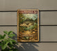 A U.S. postage stamp featuring a striped bass is displayed on a wall, with a plant to the left.