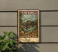 A vintage-style postage stamp featuring a fish, likely a blackfish, is displayed on a wall.