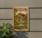 A vintage postage stamp featuring a fish, mounted on a wall next to a plant.