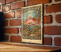 A vintage-style postage stamp featuring a red fish, likely a Vermilion Snapper, against a brick wall background.