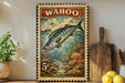 A framed vintage-style stamp depicting a fish, with the word "WAHOO" written on it, is displayed on a shelf next to a wooden cutting board and some lemons.