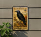 a U.S. postage stamp depicting an American crow perched on a branch.