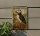 a decorative sign depicting an Atlantic puffin, a type of bird, with a pensive expression.