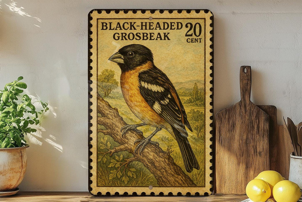 A framed postage stamp depicting a black-headed grosbeak, with a wooden cutting board and lemons in the foreground.