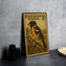 A vintage postage stamp featuring a black-headed grosbeak, with a 20 cent value, is displayed on a table next to some black camera lenses.