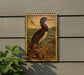 a wooden sign with a bird illustration, mounted on a wall.