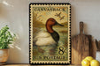 A vintage-style postage stamp featuring a duck swimming in a pond, with a wooden paddle and a potted plant in the background.
