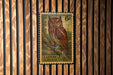 A postage stamp featuring an illustration of an Eastern Screech Owl, which is a type of owl native to the eastern United States and Canada.